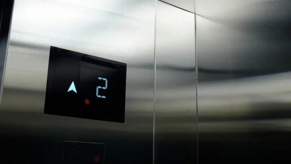 Steel elevator floor indicator showing the current level