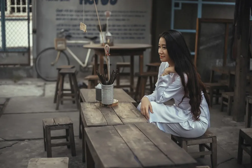 Guest seated at a cafe table