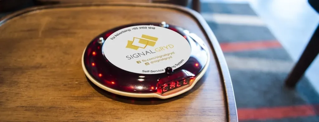 Series Classic pager on a wooden table